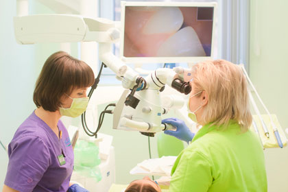 Лечение зубов под микроскопом в Минске, цены